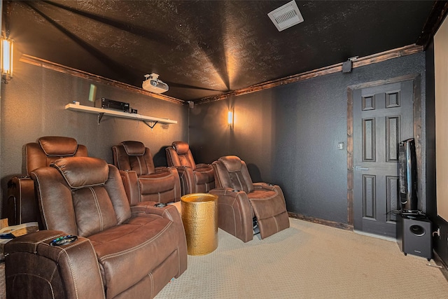 8113 Tranquil Lake Way, Conroe, TX 77385 - home theater room featuring a textured wall, carpet, and baseboards