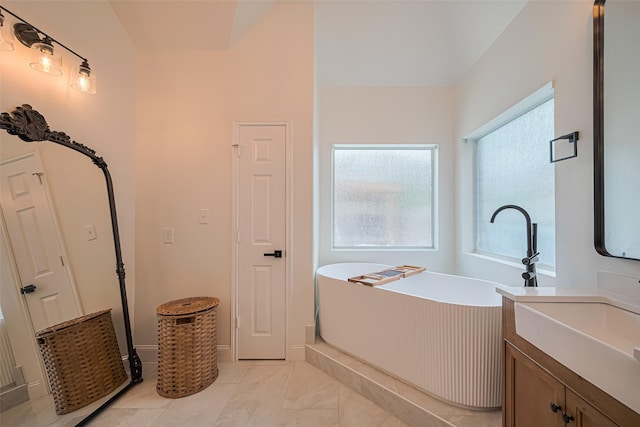 8113 Tranquil Lake Way, Conroe, TX 77385 - bathroom featuring a soaking tub and vanity
