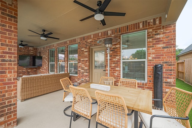 8113 Tranquil Lake Way, Conroe, TX 77385 - view of patio featuring ceiling fan and outdoor dining area