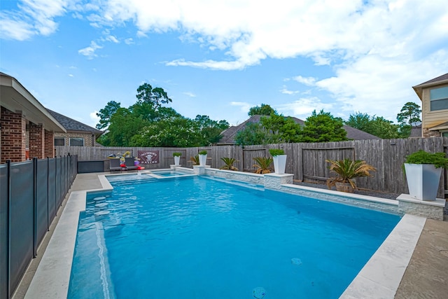 8113 Tranquil Lake Way, Conroe, TX 77385 - view of swimming pool featuring a fenced backyard