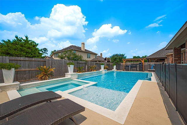 8113 Tranquil Lake Way, Conroe, TX 77385 - view of pool featuring a fenced backyard and a pool with connected hot tub