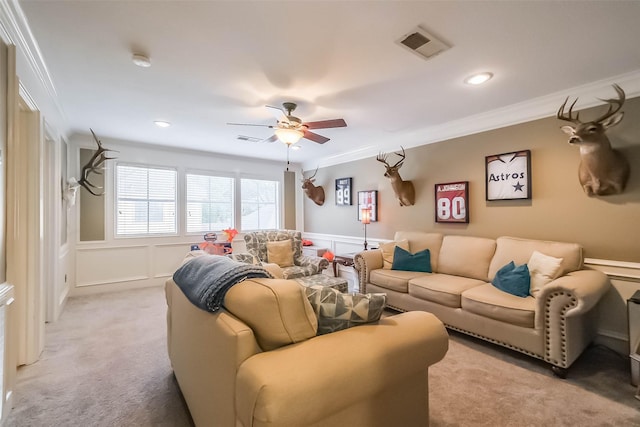 20727 Sea Pine Dr, Katy, TX 77450 - living area with ornamental molding, a decorative wall, ceiling fan, light carpet, and a wainscoted wall