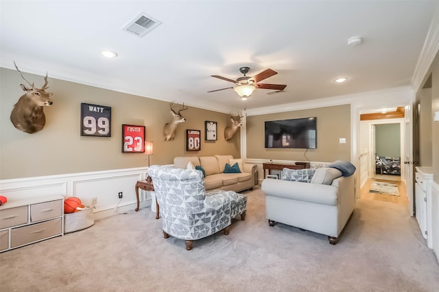20727 Sea Pine Dr, Katy, TX 77450 - living area featuring ornamental molding, carpet, a ceiling fan, wainscoting, and recessed lighting