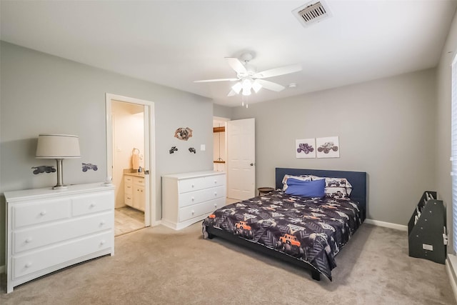 20727 Sea Pine Dr, Katy, TX 77450 - bedroom with light carpet, baseboards, ensuite bath, and ceiling fan