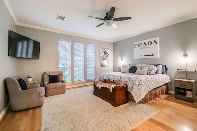 20727 Sea Pine Dr, Katy, TX 77450 - bedroom with light wood-style floors, ornamental molding, baseboards, and a ceiling fan