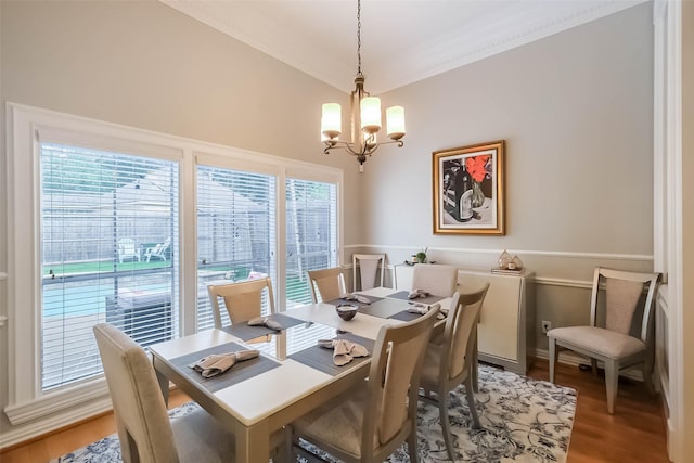 20727 Sea Pine Dr, Katy, TX 77450 - dining space featuring a chandelier, light wood-style flooring, ornamental molding, and baseboards