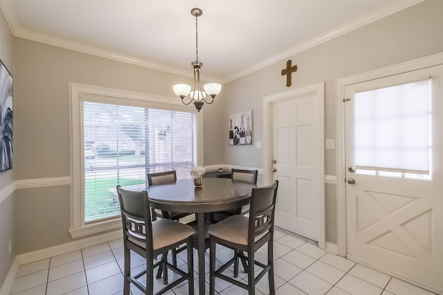 20727 Sea Pine Dr, Katy, TX 77450 - dining area featuring light tile patterned floors, ornamental molding, a chandelier, and baseboards