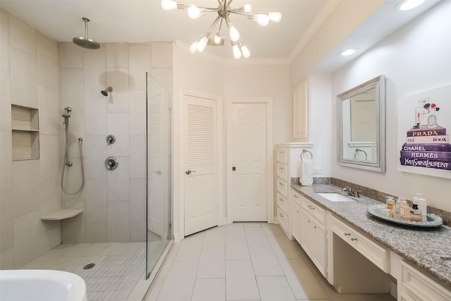 20727 Sea Pine Dr, Katy, TX 77450 - full bathroom featuring tile patterned flooring, tiled shower, a chandelier, vanity, and crown molding
