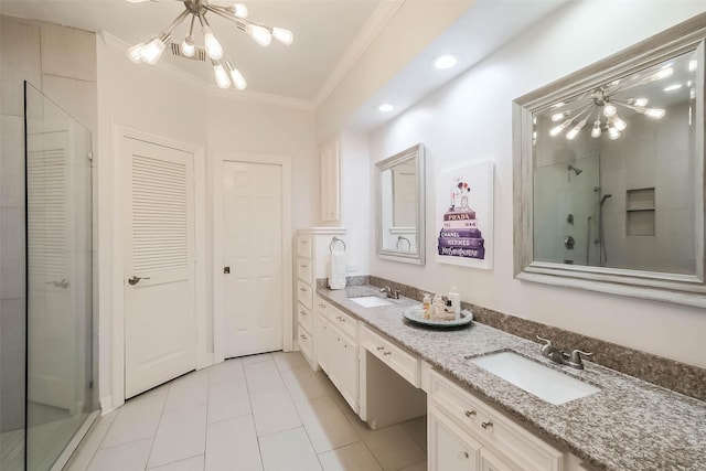 20727 Sea Pine Dr, Katy, TX 77450 - bathroom featuring a chandelier, a shower with shower door, tile patterned floors, ornamental molding, and double vanity
