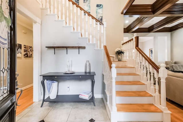 20727 Sea Pine Dr, Katy, TX 77450 - stairs with crown molding, baseboards, tile patterned flooring, and beamed ceiling