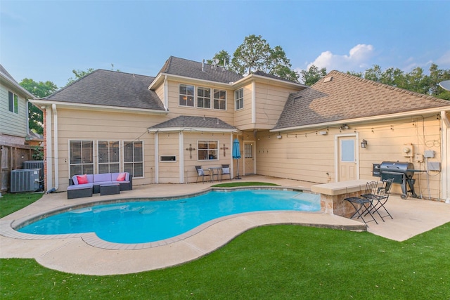 20727 Sea Pine Dr, Katy, TX 77450 - view of swimming pool with an outdoor hangout area, a patio area, grilling area, and central air condition unit