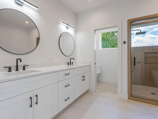 2207 Dan St, Houston, TX 77020 - full bathroom featuring double vanity and a shower stall