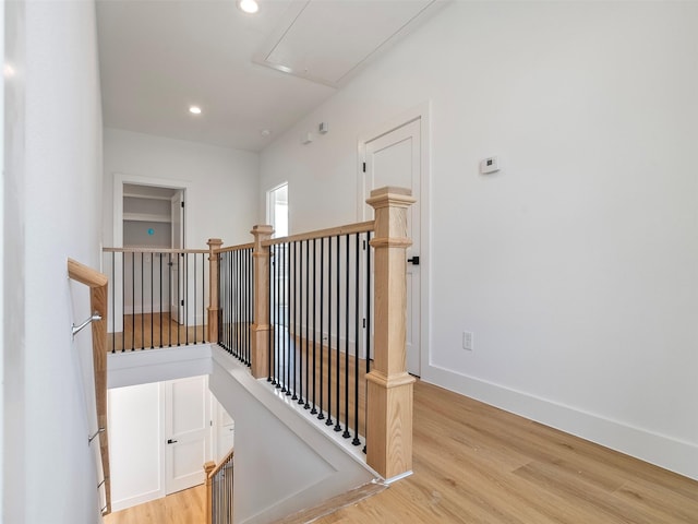 2207 Dan St, Houston, TX 77020 - stairs with attic access, wood finished floors, and recessed lighting