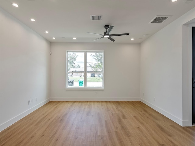 2207 Dan St, Houston, TX 77020 - spare room with light wood finished floors, recessed lighting, and a ceiling fan