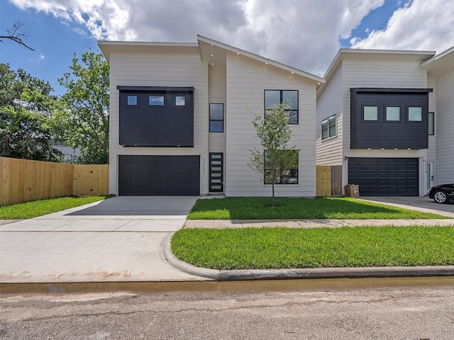 2207 Dan St, Houston, TX 77020 - contemporary home with a garage and concrete driveway