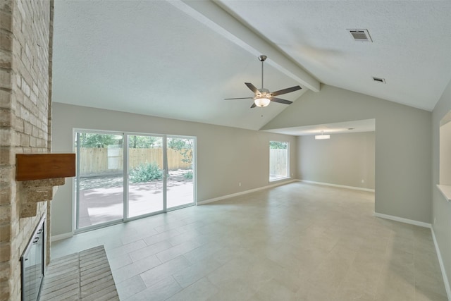60 Hickory Oak Dr, The Woodlands, TX 77381 - empty room with a brick fireplace, ceiling fan, a textured ceiling, and baseboards