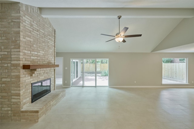 60 Hickory Oak Dr, The Woodlands, TX 77381 - unfurnished living room featuring ceiling fan, baseboards, high vaulted ceiling, a brick fireplace, and beam ceiling
