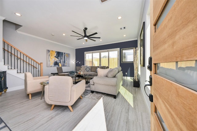 3033 Dennis St, Houston, TX 77004 - living area with baseboards, ornamental molding, recessed lighting, ceiling fan, and stairway