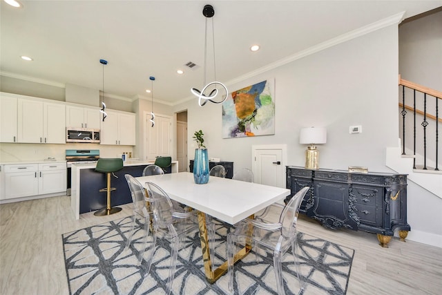3033 Dennis St, Houston, TX 77004 - dining area featuring light wood-style floors, ornamental molding, stairway, recessed lighting, and baseboards