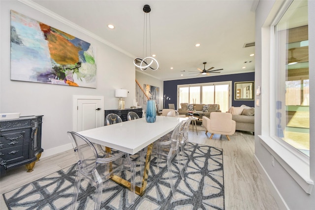 3033 Dennis St, Houston, TX 77004 - dining space featuring stairs, light wood-type flooring, recessed lighting, ornamental molding, and baseboards