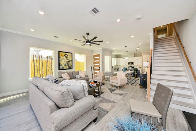 3033 Dennis St, Houston, TX 77004 - living room featuring recessed lighting, light wood finished floors, stairs, baseboards, and ceiling fan