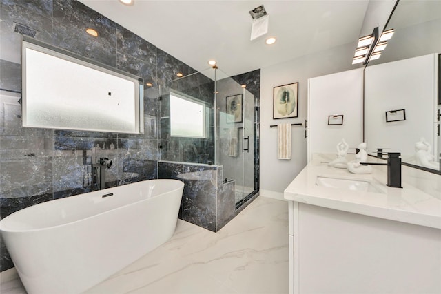 3033 Dennis St, Houston, TX 77004 - bathroom with marble tiled flooring, a shower stall, a soaking tub, double vanity, and recessed lighting