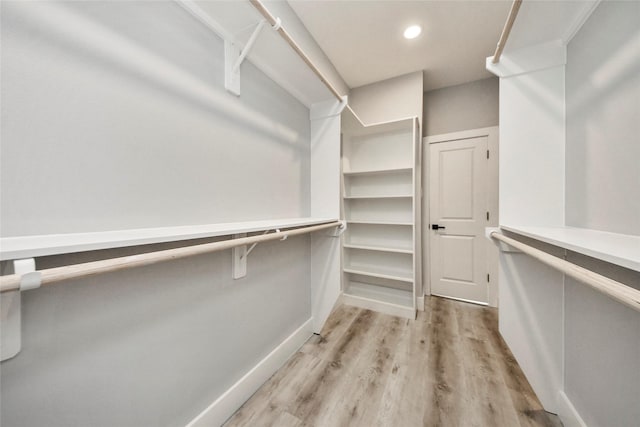 3033 Dennis St, Houston, TX 77004 - walk in closet with light wood finished floors