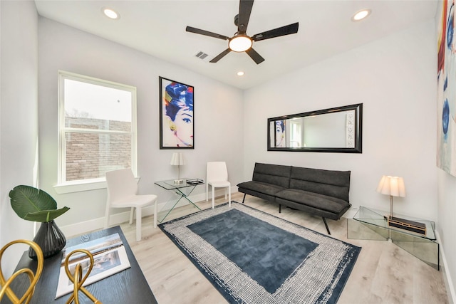 3033 Dennis St, Houston, TX 77004 - living area featuring ceiling fan, wood finished floors, recessed lighting, and baseboards