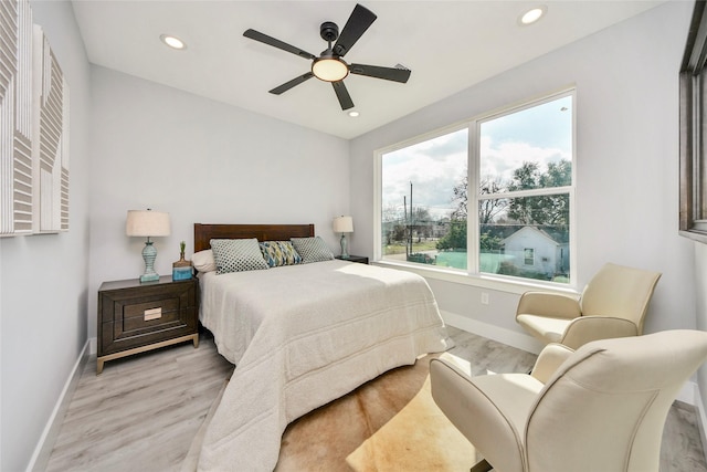 3033 Dennis St, Houston, TX 77004 - bedroom featuring wood finished floors, baseboards, recessed lighting, and ceiling fan