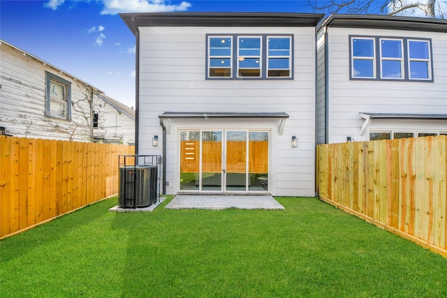 3033 Dennis St, Houston, TX 77004 - back of house with cooling unit and a patio area