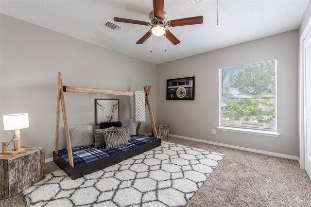 2720 Hot Springs Dr, Pearland, TX 77584 - carpeted bedroom with baseboards and ceiling fan