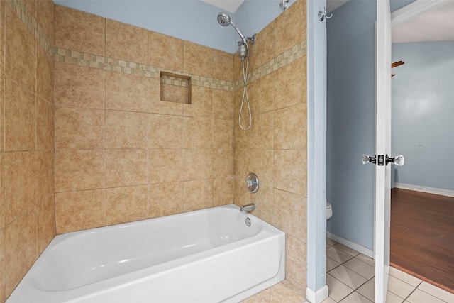 7611 Creekfield Dr, Spring, TX 77379 - bathroom with tile patterned flooring, shower / washtub combination, toilet, and baseboards