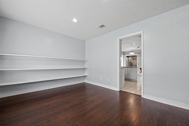 7611 Creekfield Dr, Spring, TX 77379 - spare room with wood finished floors and baseboards