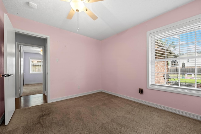 7611 Creekfield Dr, Spring, TX 77379 - empty room with carpet flooring, ceiling fan, baseboards, and a smoke detector