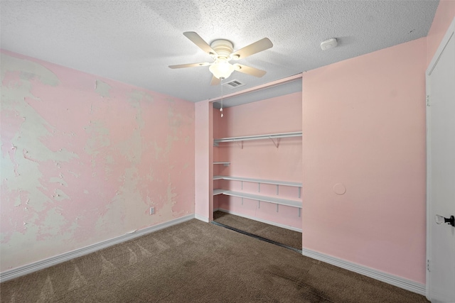 7611 Creekfield Dr, Spring, TX 77379 - unfurnished bedroom featuring carpet flooring, a closet, ceiling fan, baseboards, and a textured ceiling