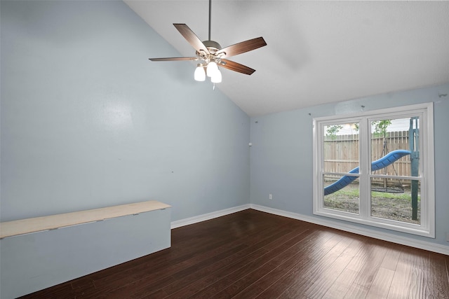 7611 Creekfield Dr, Spring, TX 77379 - unfurnished room with vaulted ceiling, dark wood-type flooring, a ceiling fan, and baseboards