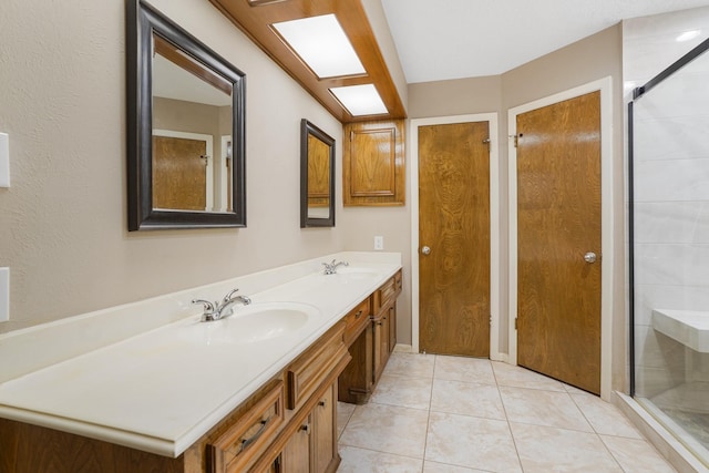 16135 Spinnaker Dr, Crosby, TX 77532 - full bathroom featuring a stall shower, double vanity, and tile patterned flooring