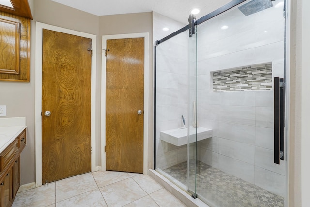 16135 Spinnaker Dr, Crosby, TX 77532 - full bath with a stall shower, vanity, and tile patterned floors