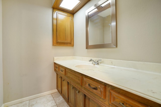 16135 Spinnaker Dr, Crosby, TX 77532 - bathroom with vanity, baseboards, and tile patterned flooring