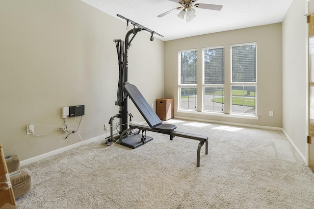 16135 Spinnaker Dr, Crosby, TX 77532 - workout room featuring a ceiling fan, carpet flooring, and baseboards