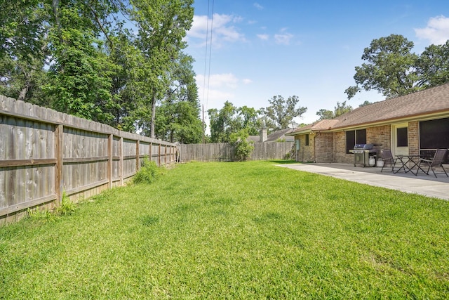 16135 Spinnaker Dr, Crosby, TX 77532 - view of yard with a patio area