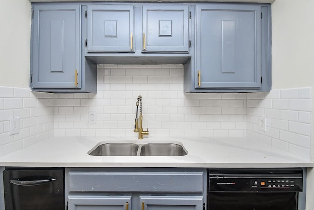 10378 Briar Forest Dr Unit 32/5, Houston, TX 77042 - kitchen featuring dishwasher, a sink, light countertops, tasteful backsplash, and gray cabinets