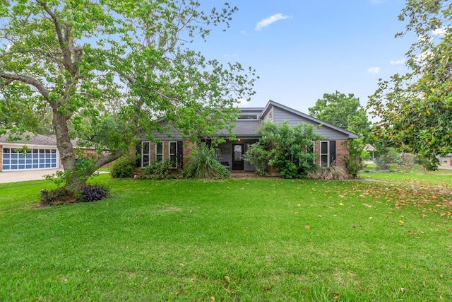 535 Oyster Creek Dr, Richwood, TX 77531 - view of grassy yard with a garage