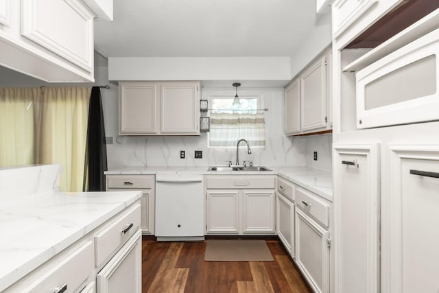 535 Oyster Creek Dr, Richwood, TX 77531 - kitchen featuring white appliances, a sink, dark wood-style flooring, and light stone counters