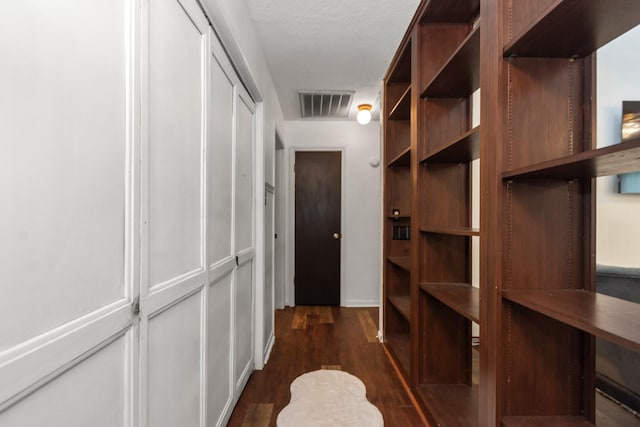 535 Oyster Creek Dr, Richwood, TX 77531 - spacious closet featuring dark wood-type flooring