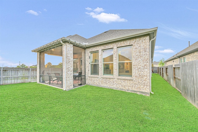 10702 Pleasant View Dr, Missouri City, TX 77459 - back of property featuring brick siding and a shingled roof