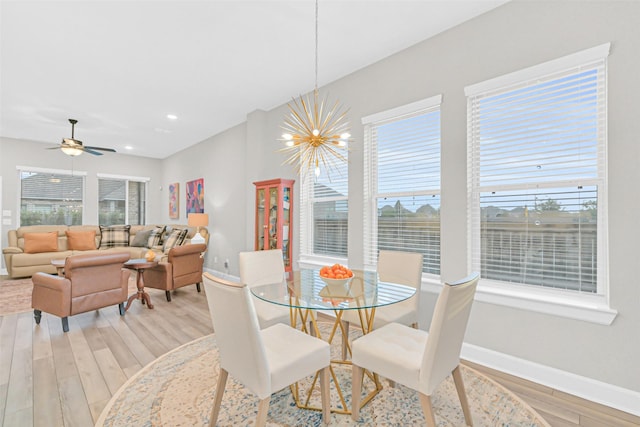 10702 Pleasant View Dr, Missouri City, TX 77459 - dining space featuring light wood-style flooring, baseboards, a chandelier, and recessed lighting