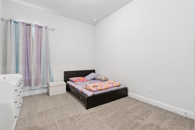 6422 Tiburon Lakes Dr, Katy, TX 77493 - bedroom with light carpet and baseboards