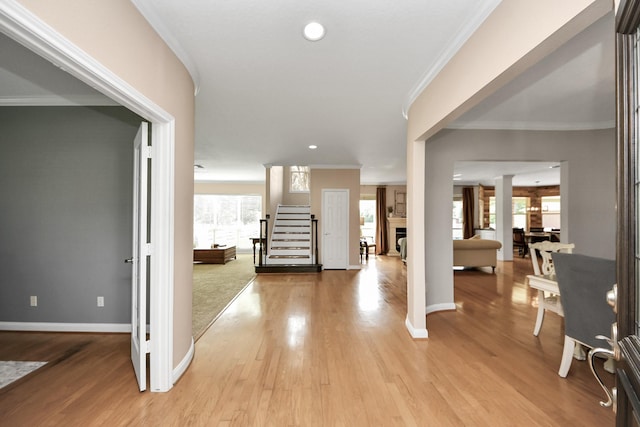 1140 Bartlett Rd, Katy, TX 77493 - entrance foyer featuring healthy amount of natural light, stairs, recessed lighting, light wood-type flooring, and crown molding