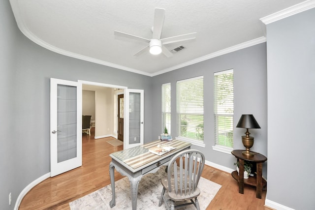 1140 Bartlett Rd, Katy, TX 77493 - office space featuring french doors, light wood-type flooring, ornamental molding, a ceiling fan, and baseboards